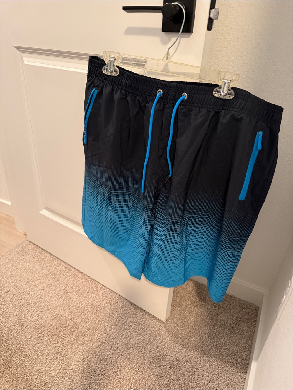 Amazon Men’s Black and Blue Gradient Swim Trunks with Zip Pockets